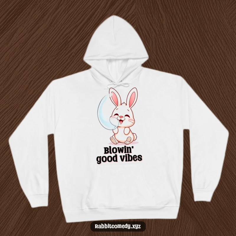 Funny hoodie featuring a giggling rabbit blowing a large bubble showing its own happy, reflected face.