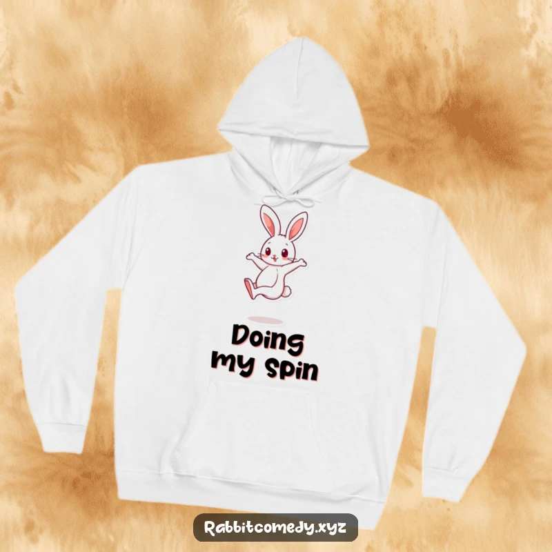 Funny cartoon rabbit character balancing on one leg, spinning quickly on a humorous hoodie, great for comfort.