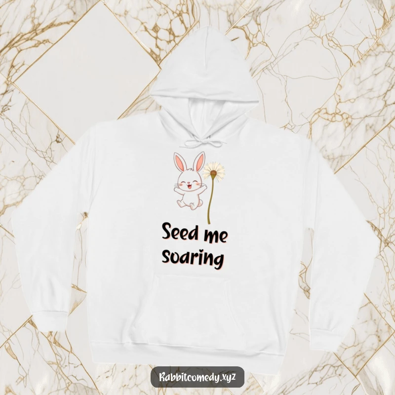 Funny hoodie depicting a determined rabbit character attempting to fly using giant dandelion seeds, showing ambitious spirit.