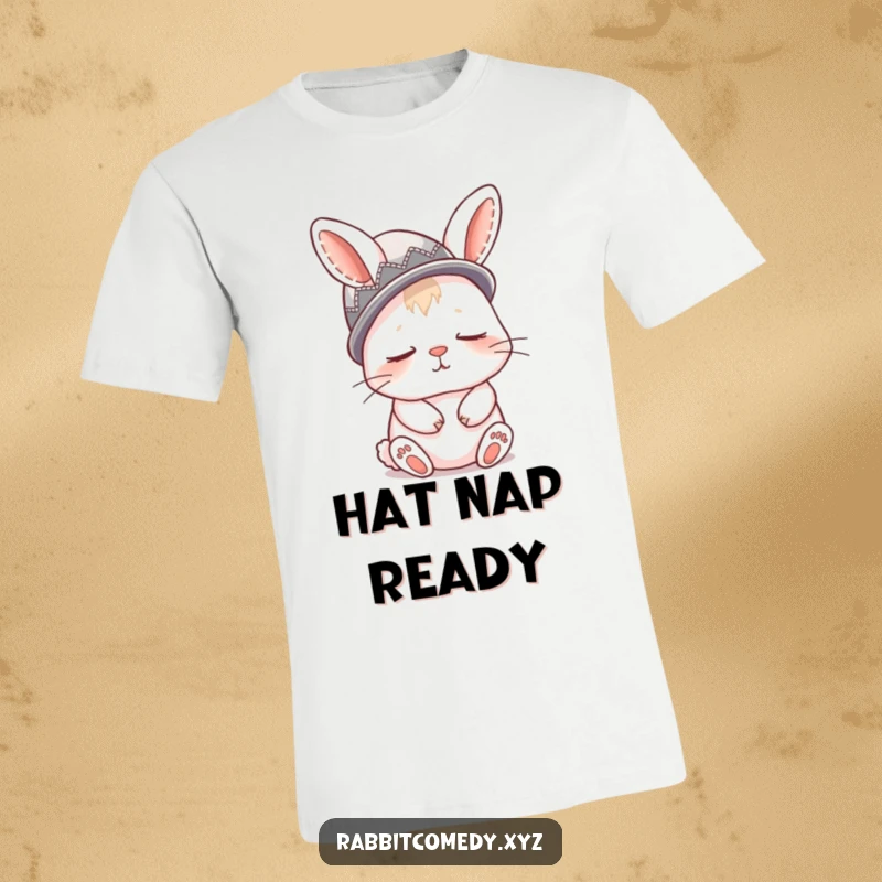 Funny t-shirt depicting a very sleepy rabbit comically wearing a thimble as a hat, looking ready for a nap.